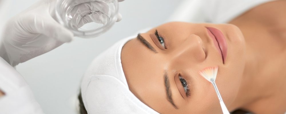 young-woman-doing-procedure-face-beautician